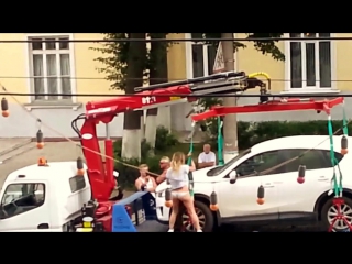 striptease on a tow truck